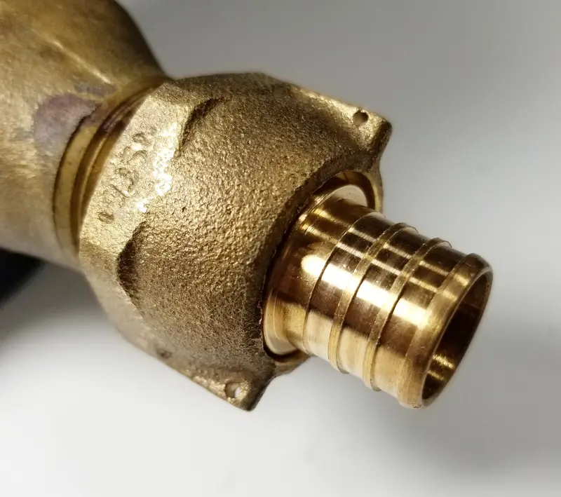 Lead-Free Brass 5/8" Water Meter Coupling – Swivel Nut With 3/4" Pex Barb 1