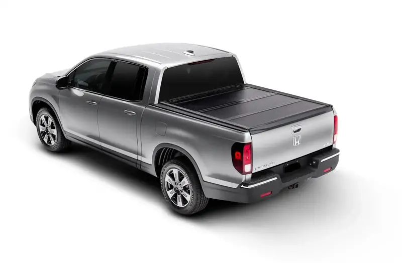 Low-Profile Hard Folding Tonneau Cover For Dodge Ram 1500 (2009–2023, 5'7" Bed) 1